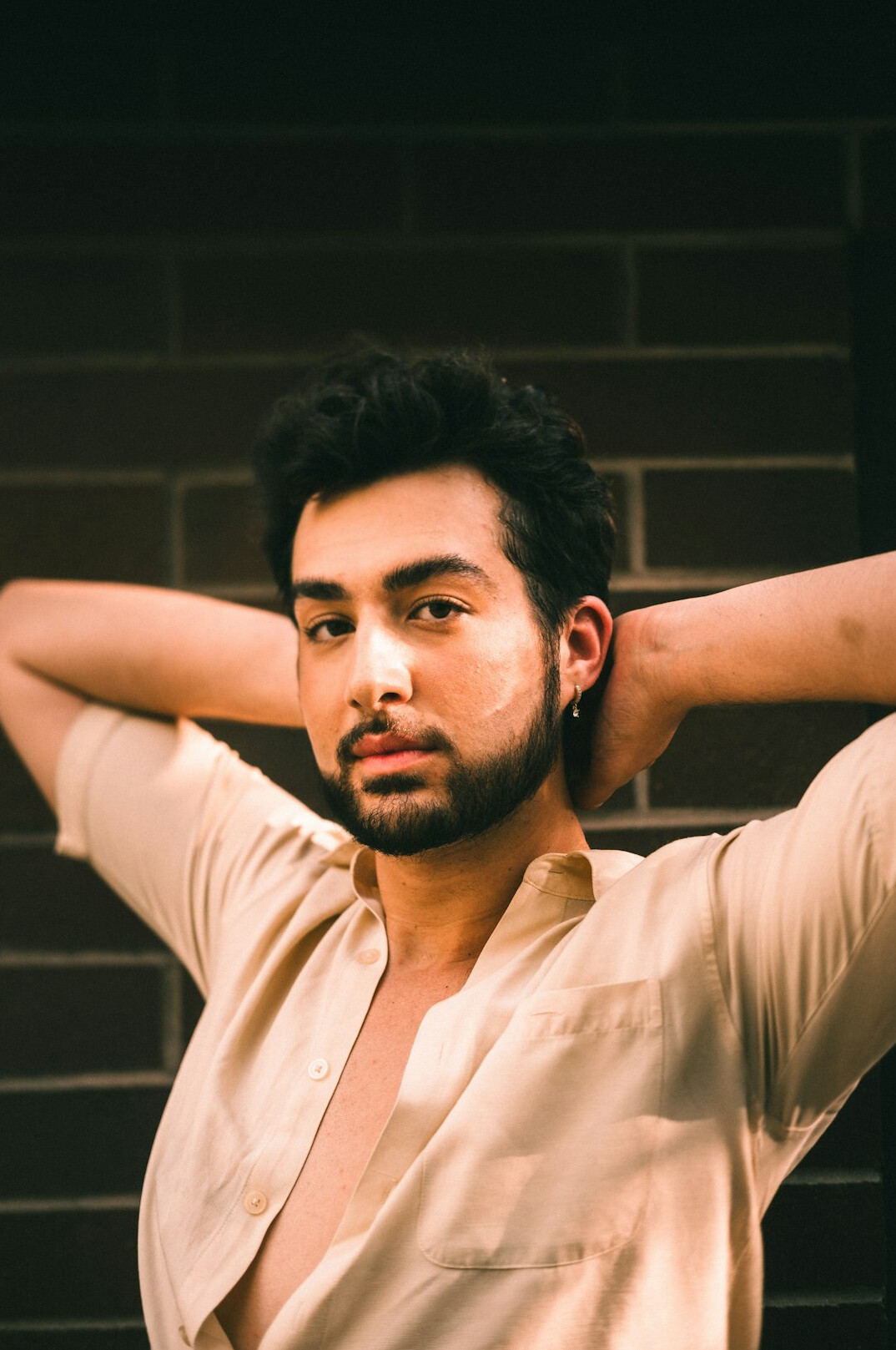 Portrait of a man with a light beard wearing a shirt